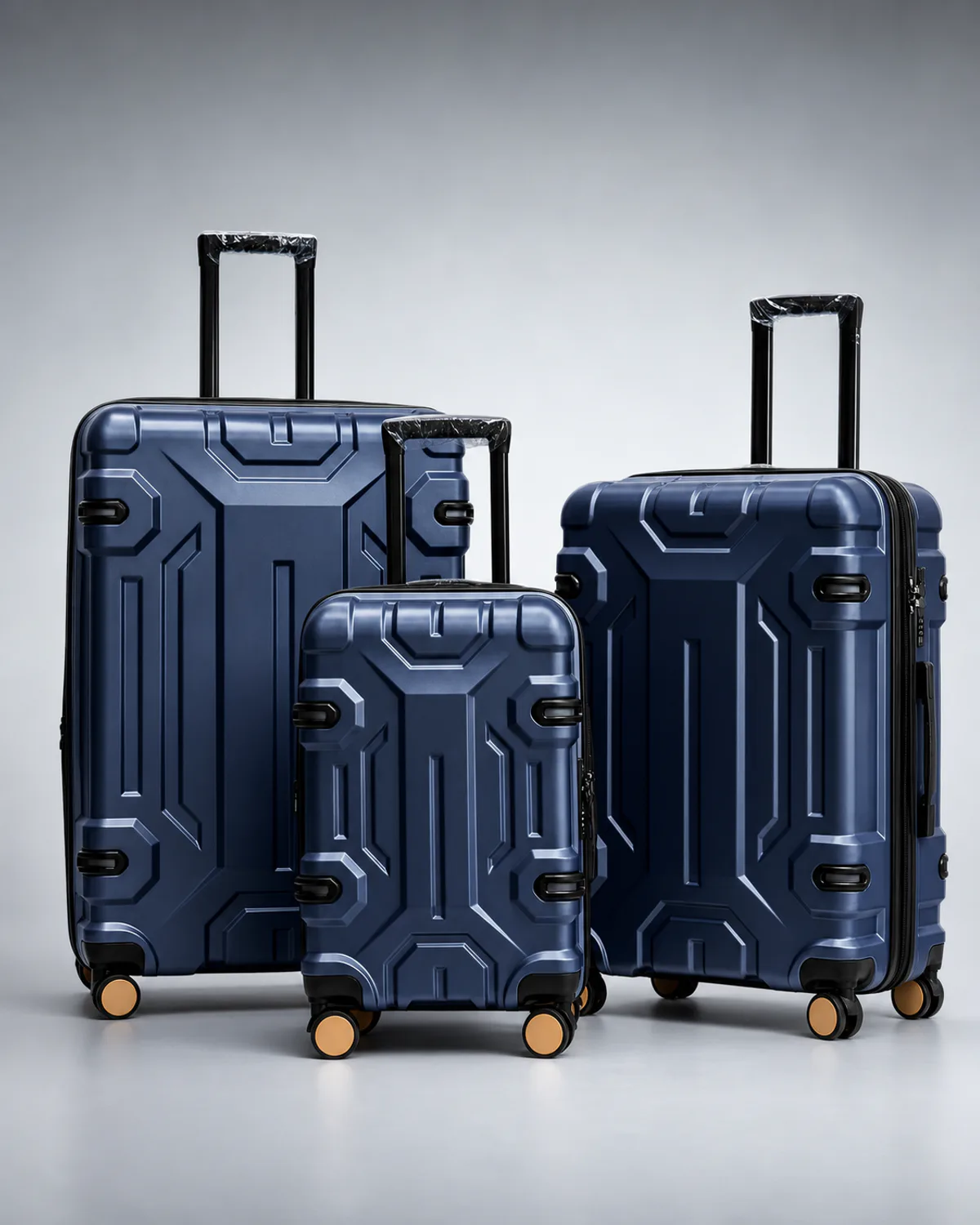 Deep navy three-piece luggage set based on a supplied product photo